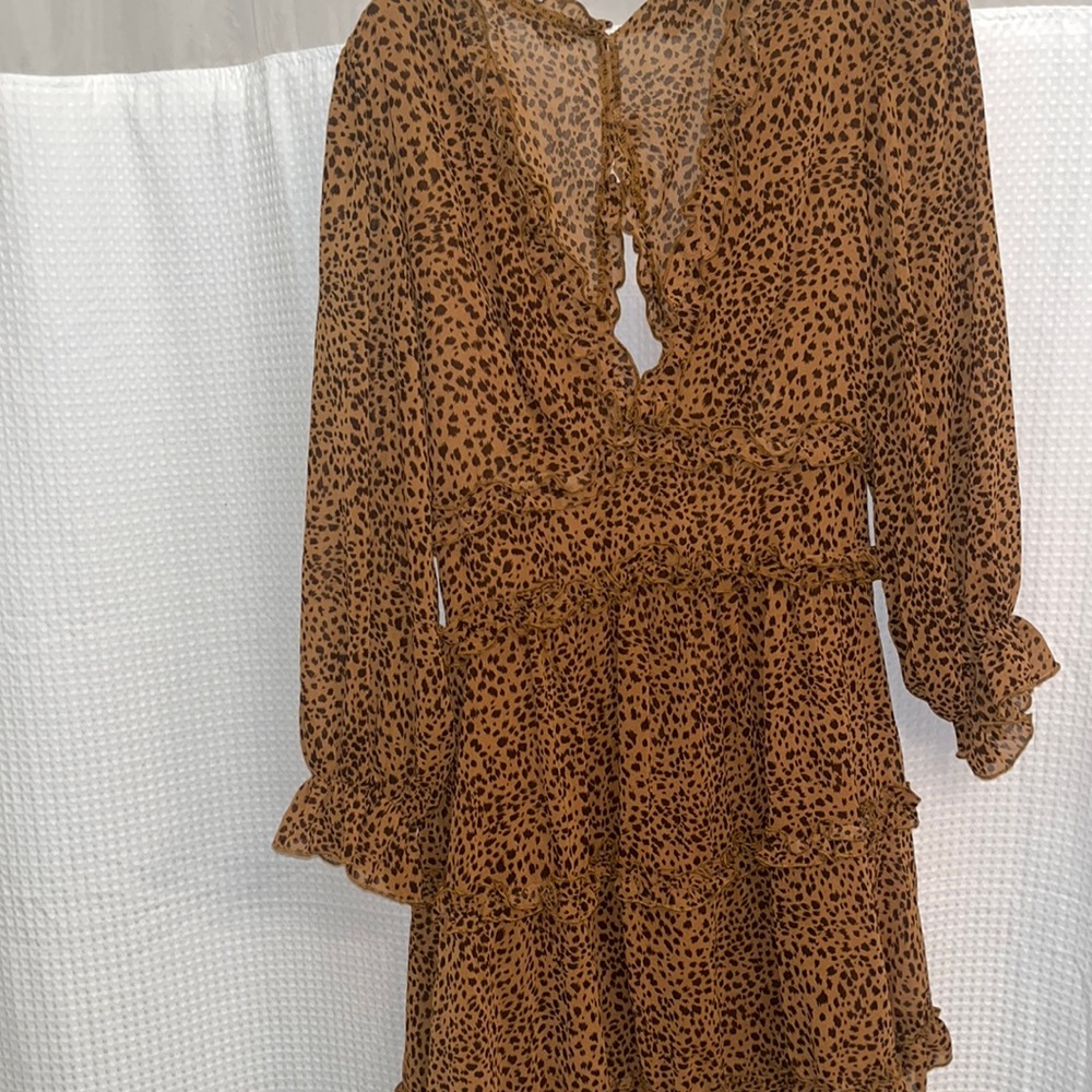 Deep V leopard dress with open back
